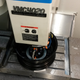 Enlargening the center hole on the wheels with a milling machine.